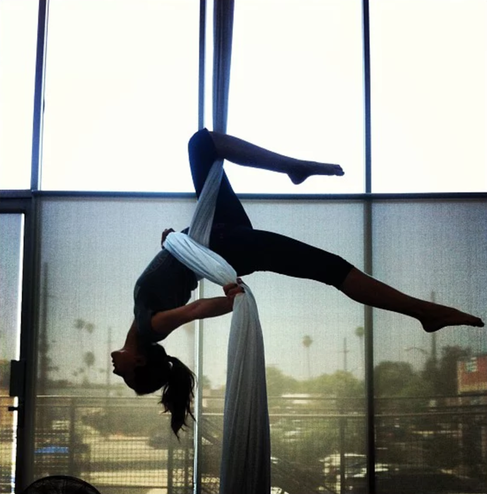 Troian Bellisario doing aerial silks